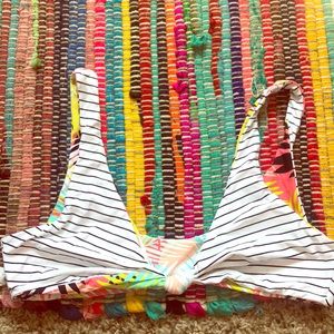 Reversible rip curl bathing suit top.